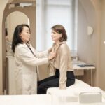 Doctor conducting 45-49 health assessment with patient at Weston Creek Family Medical